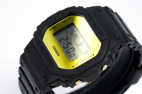 Orologio Casio G-Shock da uomo con quadrante quadrato in oro metallizzato e specchio DW-5600BBMB-1DR 