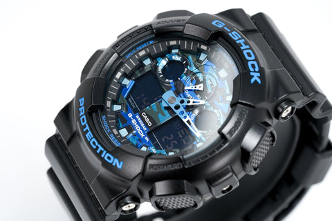 Orologio Casio G-Shock da uomo blu mimetico GA-100CB-1ADR 